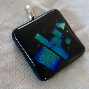 Black Glass Pendant with Iridescent Accents